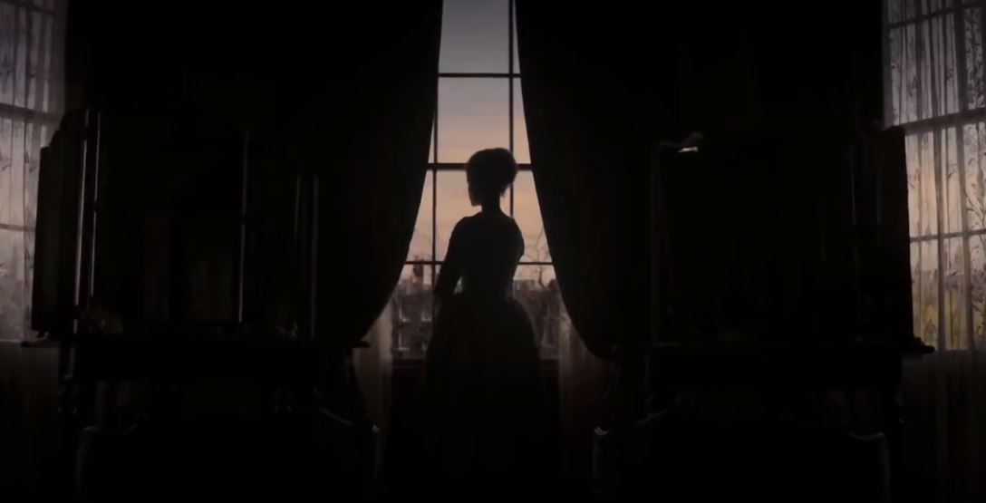 Woman standing in front of window from Belle period drama